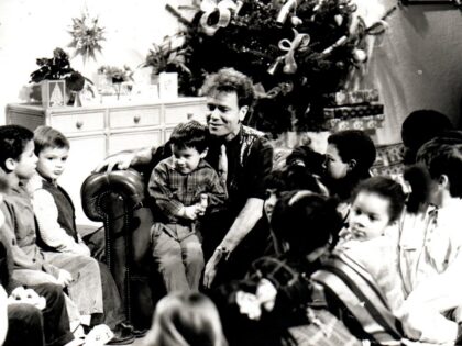 Cliff Richard with One World Players on TV-am, Christmas Day 1990.